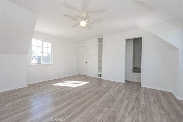1949 Lancewood Ave, Hacienda Heights, CA 91745 - additional living space with wood finished floors, a ceiling fan, built in features, baseboards, and lofted ceiling