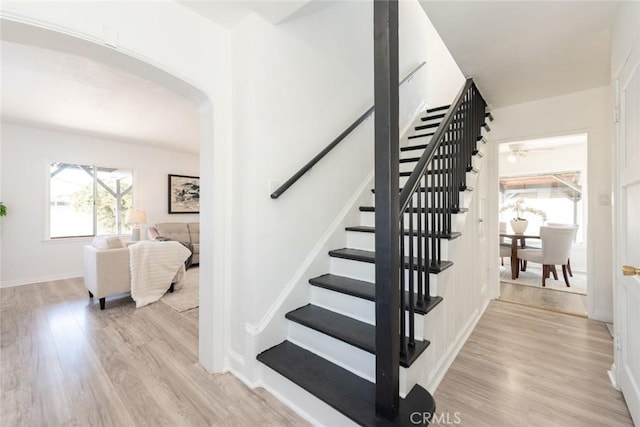 1949 Lancewood Ave, Hacienda Heights, CA 91745 - stairway with arched walkways, wood finished floors, and baseboards