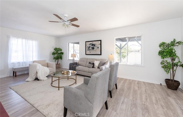 1949 Lancewood Ave, Hacienda Heights, CA 91745 - living room featuring light wood-style flooring, plenty of natural light, a ceiling fan, and baseboards