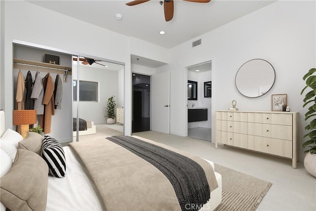 5016 Bakman Ave Unit 306, North Hollywood, CA 91601 - bedroom featuring connected bathroom, a ceiling fan, a closet, visible vents, and light carpet