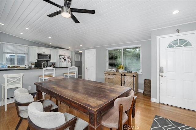 dining area featuring lofted ceiling, recessed lighting, ceiling fan, light wood finished floors, and wood ceiling