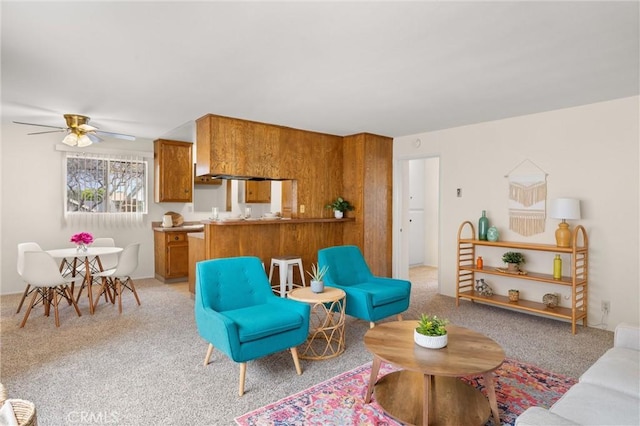 660 Stanley Ave, Long Beach, CA 90814 - living area featuring ceiling fan and light colored carpet