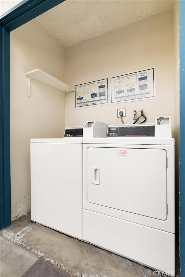 660 Stanley Ave, Long Beach, CA 90814 - community laundry room featuring separate washer and dryer
