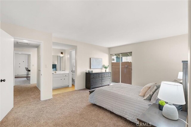 660 Stanley Ave, Long Beach, CA 90814 - bedroom featuring ensuite bathroom and light colored carpet