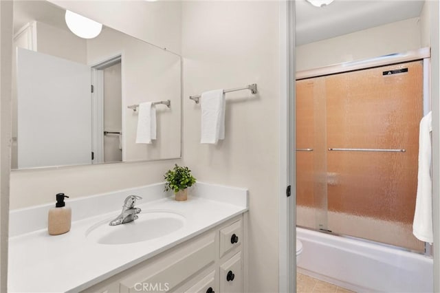 660 Stanley Ave, Long Beach, CA 90814 - bathroom with vanity, toilet, and shower / bath combination with glass door