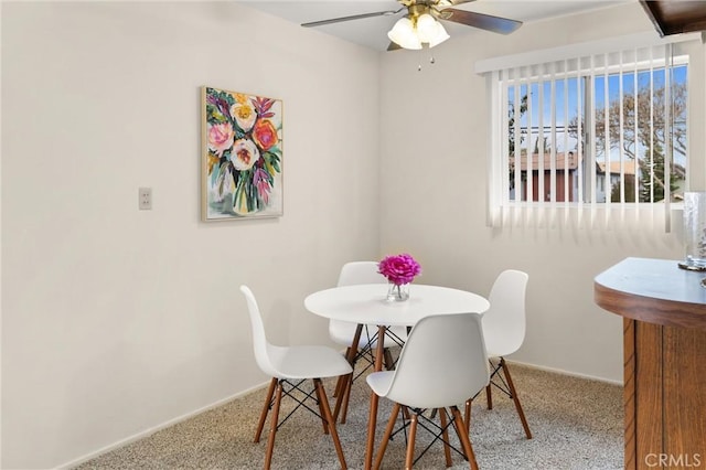 660 Stanley Ave, Long Beach, CA 90814 - carpeted dining space with baseboards and a ceiling fan