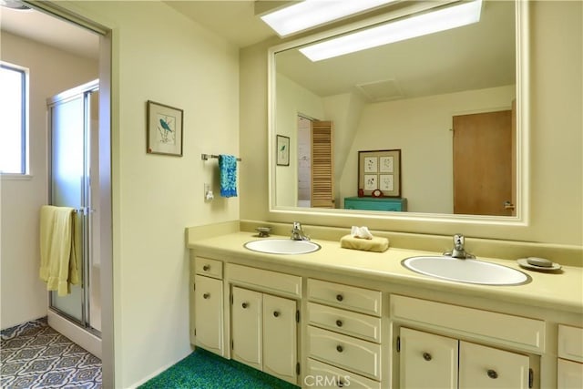 60027 Cascadel Dr S, North Fork, CA 93643 - bathroom with double vanity and an enclosed shower