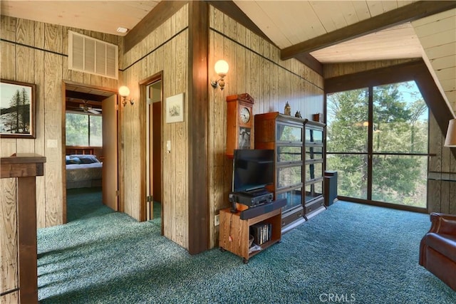 60027 Cascadel Dr S, North Fork, CA 93643 - carpeted living area featuring wooden walls, ceiling fan, and wooden ceiling