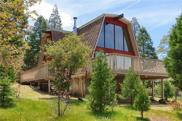 60027 Cascadel Dr S, North Fork, CA 93643 - rear view of property featuring a wooden deck and a gambrel roof