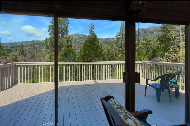 60027 Cascadel Dr S, North Fork, CA 93643 - wooden deck with a forest view