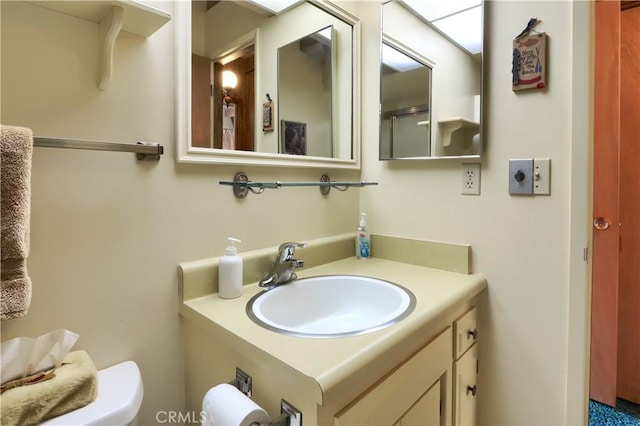 60027 Cascadel Dr S, North Fork, CA 93643 - bathroom with vanity and toilet