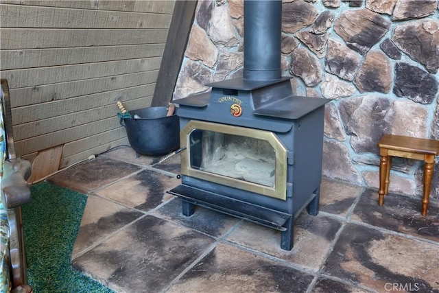 60027 Cascadel Dr S, North Fork, CA 93643 - detailed view of a wood stove and wood walls