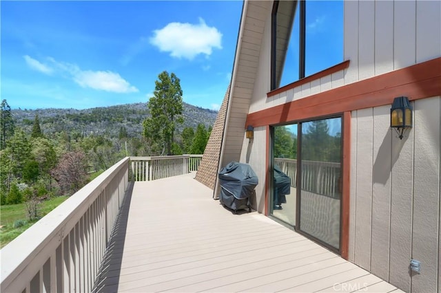 60027 Cascadel Dr S, North Fork, CA 93643 - deck with grilling area and a wooded view
