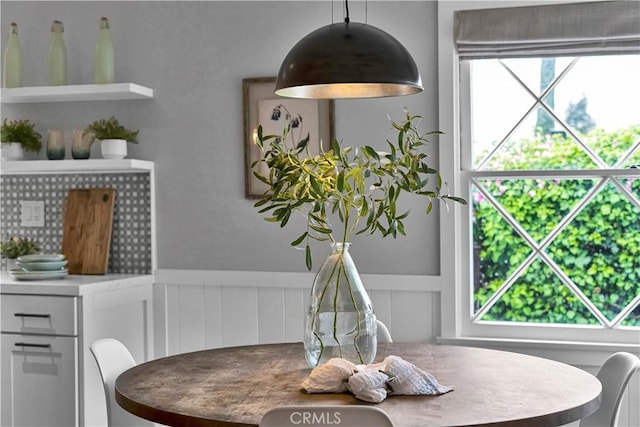 21820 Dumetz Rd, Woodland Hills, CA 91364 - dining area featuring wainscoting