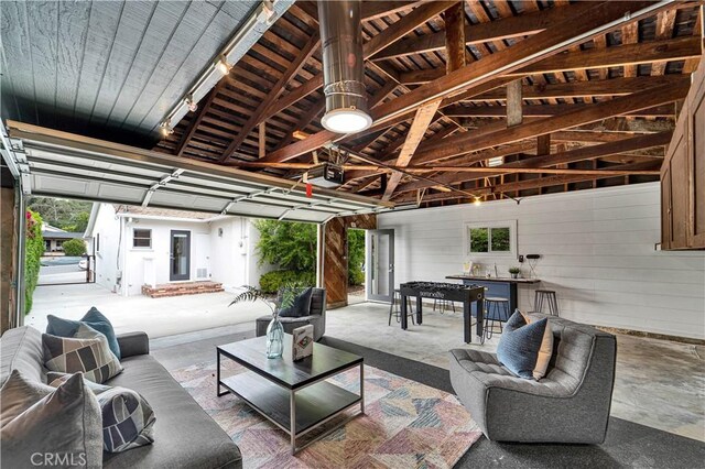 21820 Dumetz Rd, Woodland Hills, CA 91364 - garage featuring wood walls