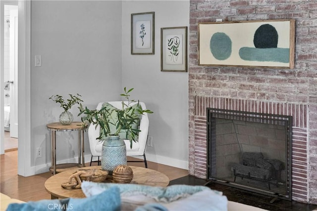 21820 Dumetz Rd, Woodland Hills, CA 91364 - living room with a brick fireplace and wood finished floors