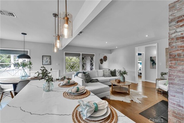 21820 Dumetz Rd, Woodland Hills, CA 91364 - living room with wood finished floors, baseboards, and recessed lighting