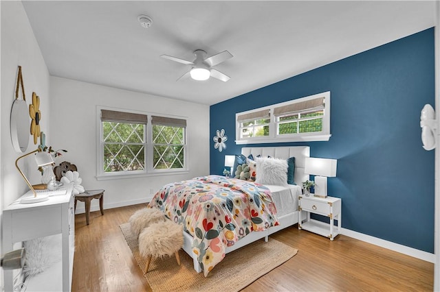 21820 Dumetz Rd, Woodland Hills, CA 91364 - bedroom featuring baseboards, wood finished floors, and a ceiling fan