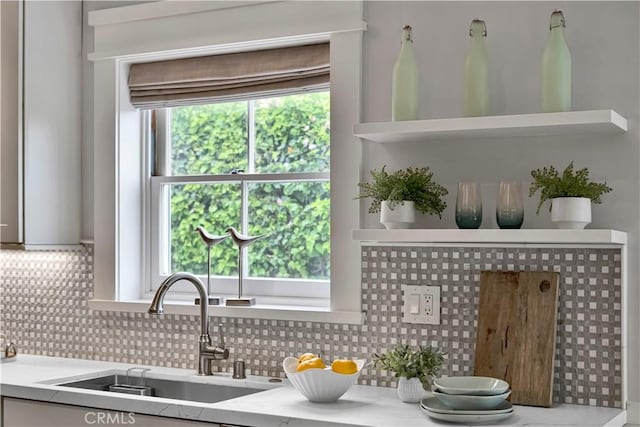 21820 Dumetz Rd, Woodland Hills, CA 91364 - kitchen with backsplash, open shelves, and light countertops
