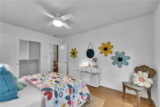 21820 Dumetz Rd, Woodland Hills, CA 91364 - bedroom with wood finished floors, a closet, and a ceiling fan