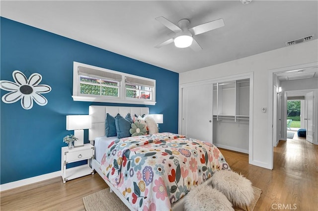 21820 Dumetz Rd, Woodland Hills, CA 91364 - bedroom featuring a closet, wood finished floors, and a ceiling fan