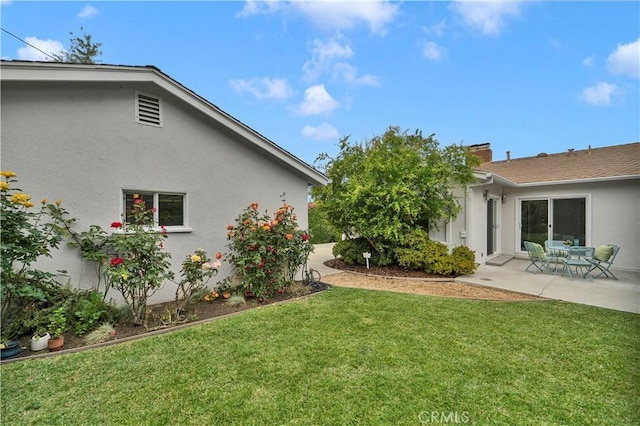 21820 Dumetz Rd, Woodland Hills, CA 91364 - view of grassy yard with a patio area