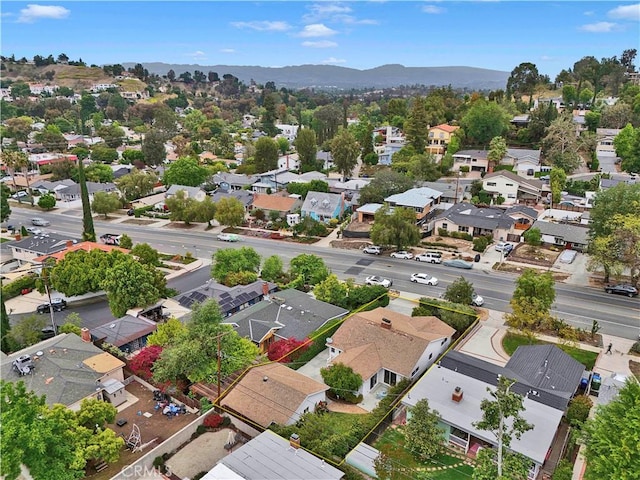 21820 Dumetz Rd, Woodland Hills, CA 91364 - aerial perspective of suburban area with a mountain backdrop