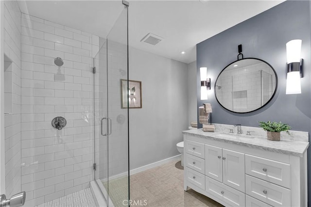 21820 Dumetz Rd, Woodland Hills, CA 91364 - bathroom featuring a stall shower, vanity, and tile patterned floors