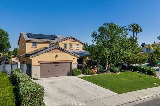 12200 White Rapids Way, Bakersfield, CA 93311 - view of front of home featuring stucco siding, solar panels, driveway, and a tile roof