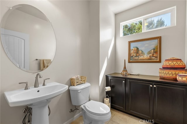 12200 White Rapids Way, Bakersfield, CA 93311 - bathroom featuring toilet, tile patterned floors, baseboards, and a sink