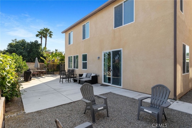 12200 White Rapids Way, Bakersfield, CA 93311 - rear view of house featuring a patio area, stucco siding, and outdoor lounge area
