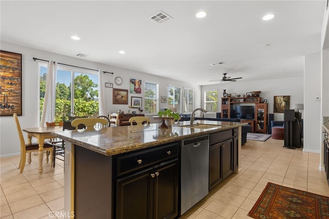 12200 White Rapids Way, Bakersfield, CA 93311 - kitchen with dishwasher, a sink, light tile patterned floors, healthy amount of natural light, and recessed lighting