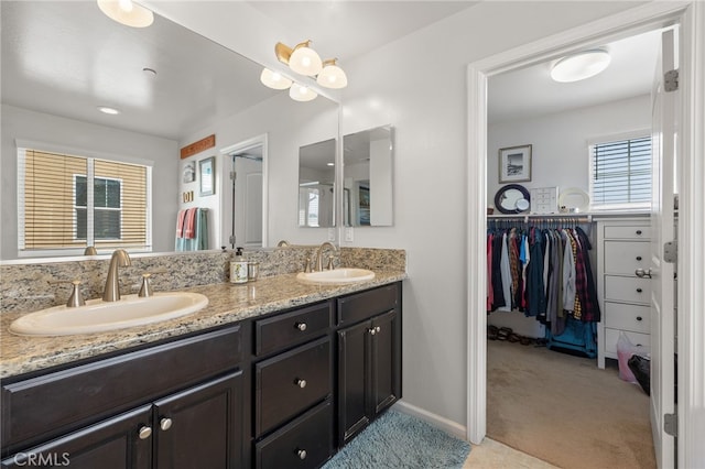12200 White Rapids Way, Bakersfield, CA 93311 - bathroom with double vanity and a spacious closet