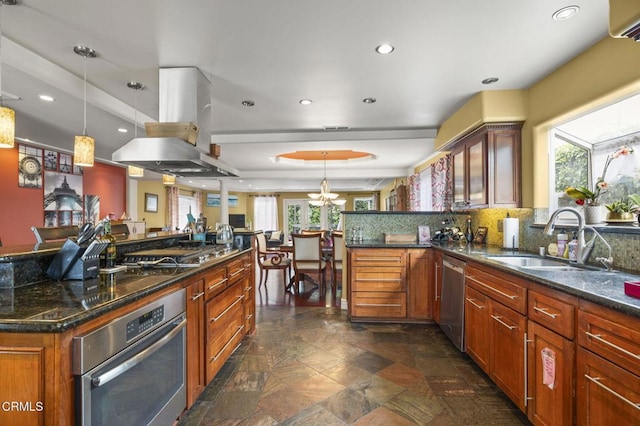 kitchen featuring stainless steel appliances, a sink, recessed lighting, and island range hood