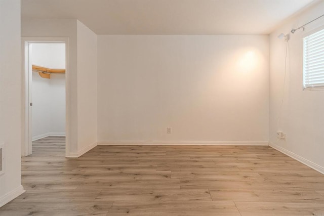 9860 Dale Ave Unit D10, Spring Valley, CA 91977 - unfurnished room featuring light wood-style flooring and baseboards