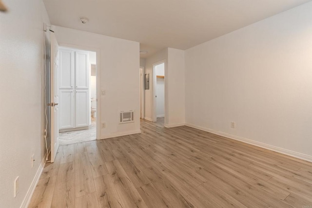 9860 Dale Ave Unit D10, Spring Valley, CA 91977 - spare room featuring light wood-style floors and a smoke detector