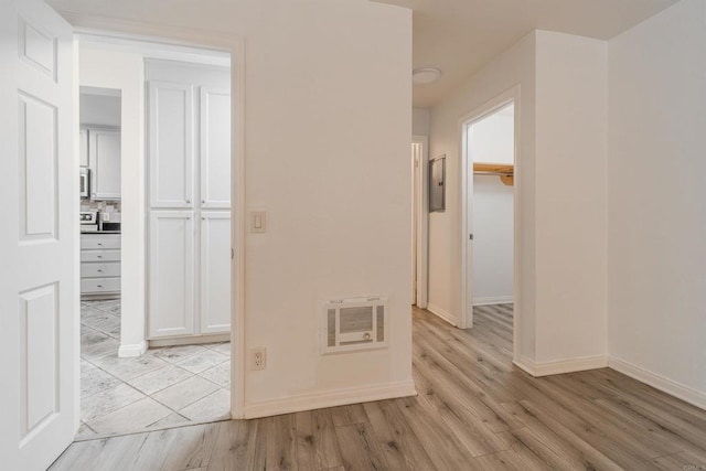 9860 Dale Ave Unit D10, Spring Valley, CA 91977 - hallway featuring light wood-type flooring and electric panel