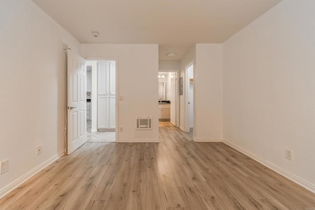 9860 Dale Ave Unit D10, Spring Valley, CA 91977 - spare room featuring light wood-type flooring and a smoke detector