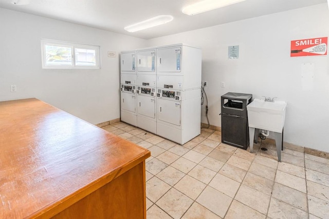 9860 Dale Ave Unit D10, Spring Valley, CA 91977 - community laundry featuring estacked washer and dryer, independent washer and dryer, and light tile patterned flooring