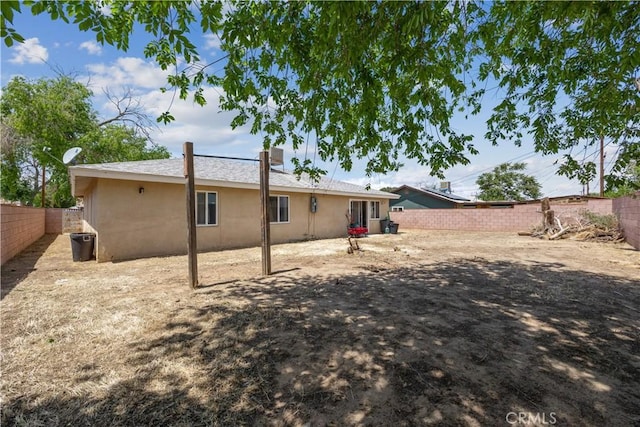 45324 Rodin Ave, Lancaster, CA 93535 - back of house with stucco siding and a fenced backyard