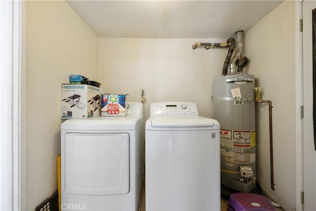 45324 Rodin Ave, Lancaster, CA 93535 - laundry room featuring secured water heater, laundry area, and washing machine and dryer
