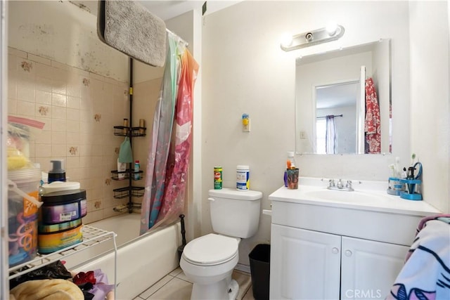 45324 Rodin Ave, Lancaster, CA 93535 - full bathroom with vanity, toilet, shower / bath combo with shower curtain, and tile patterned floors