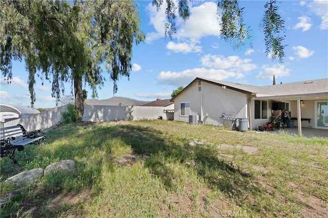 24811 Sundial Way, Moreno Valley, CA 92557 - view of yard featuring central air condition unit and a patio