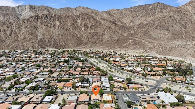 birds eye view of property featuring a residential view and a mountain view