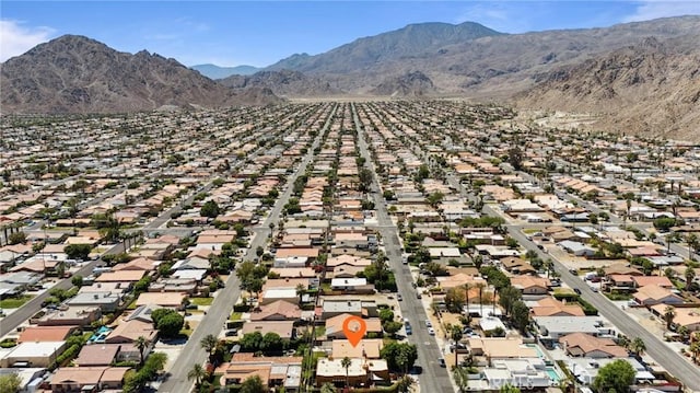bird's eye view with a mountain view and a residential view