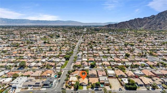 bird's eye view featuring a mountain view and a residential view