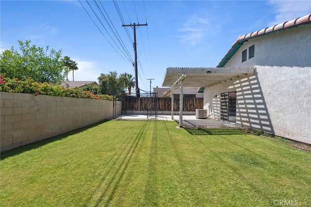 view of yard with central AC unit, a pergola, and a fenced backyard