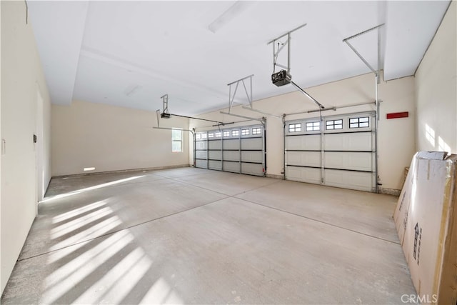 garage featuring a garage door opener