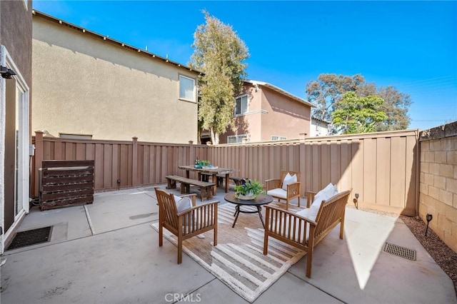 2852 N Santa Fe Pl, Orange, CA 92865 - view of patio / terrace with a fenced backyard and outdoor dining area