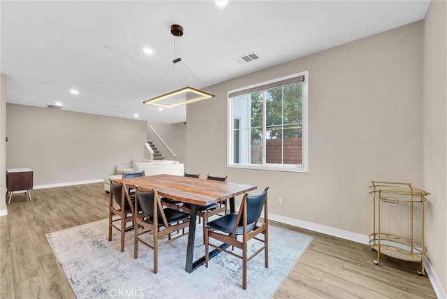 26 Wagon Wheel St, Phillips Ranch, CA 91766 - dining space with light wood-style floors, stairs, baseboards, and recessed lighting